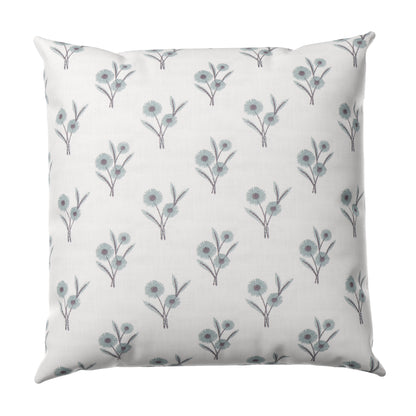 Decorative pillow with floral pattern on a white background